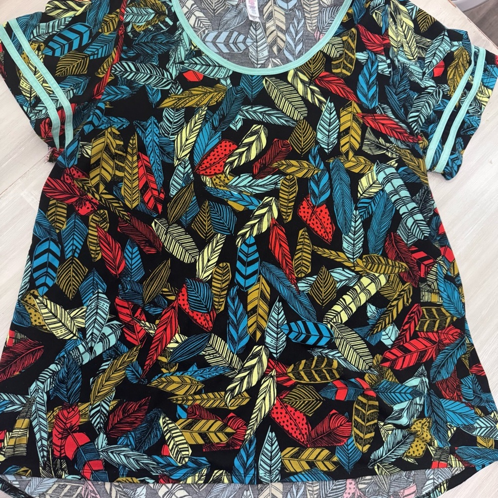 Women’s LuLaRoe Classic Feather Print Tee in Black with Multicolor Feathers